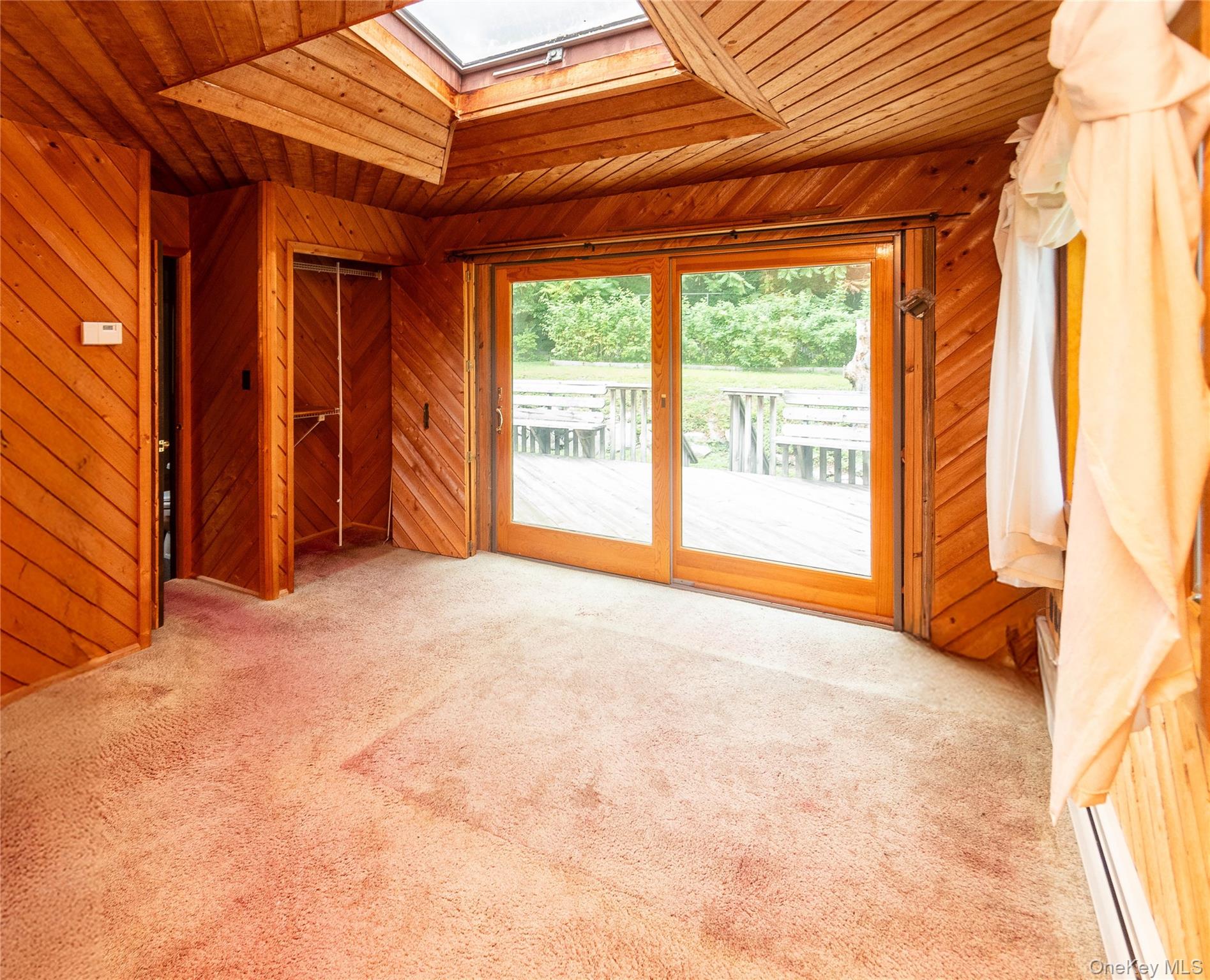 105 Jarmain Road Monroe, NY 10950 - Photo 20 of 40 a view of an empty room with a window