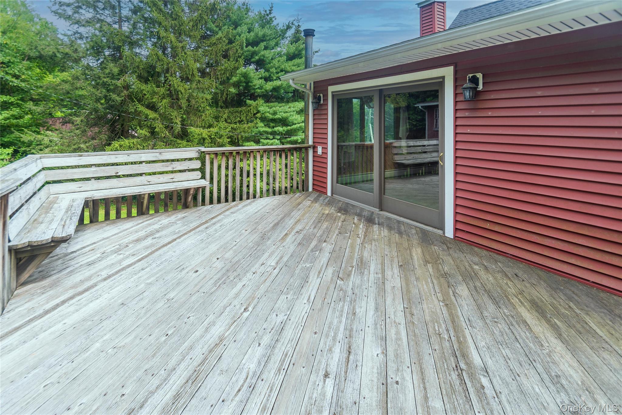 105 Jarmain Road Monroe, NY 10950 - Photo 29 of 40 a view of a balcony with wooden floor and fence