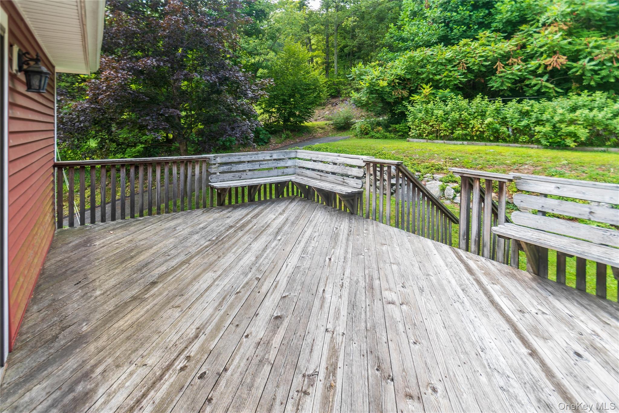 105 Jarmain Road Monroe, NY 10950 - Photo 30 of 40 a balcony with trees in front of it