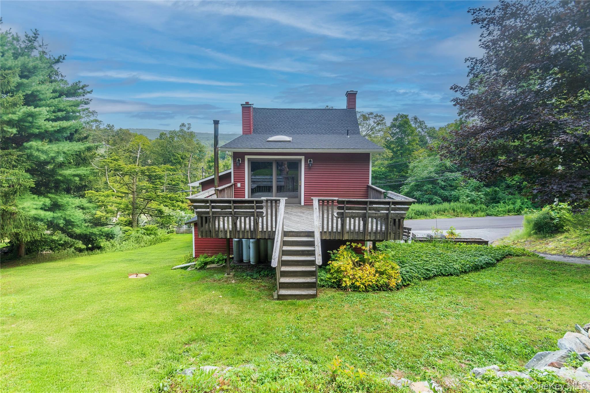 105 Jarmain Road Monroe, NY 10950 - Photo 33 of 40 a front view of a house with a yard