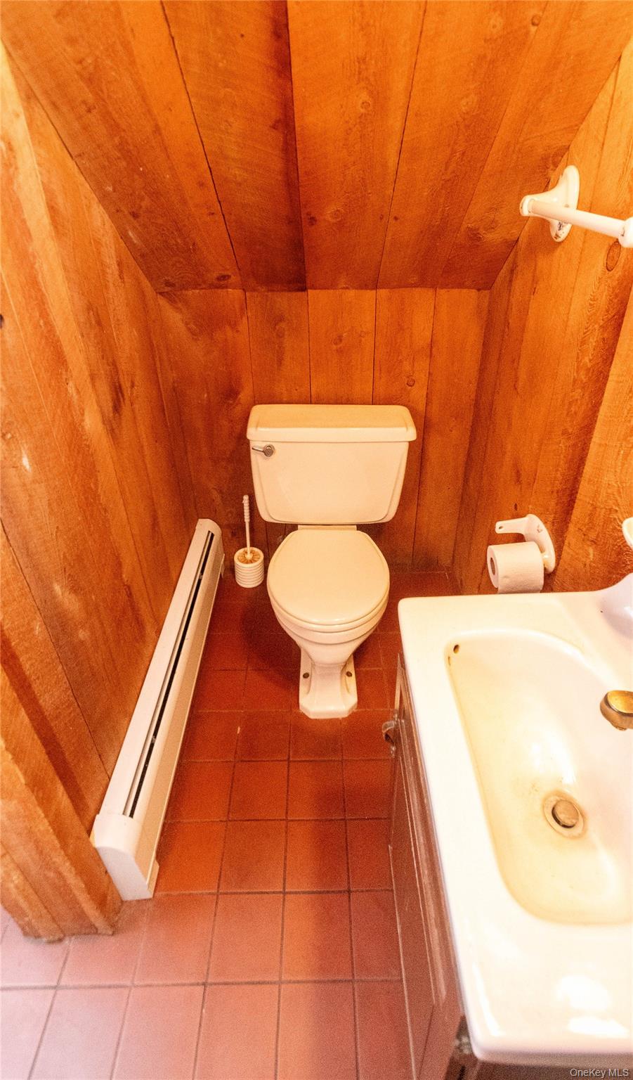 105 Jarmain Road Monroe, NY 10950 - Photo 4 of 40 a bathroom with a toilet and a sink