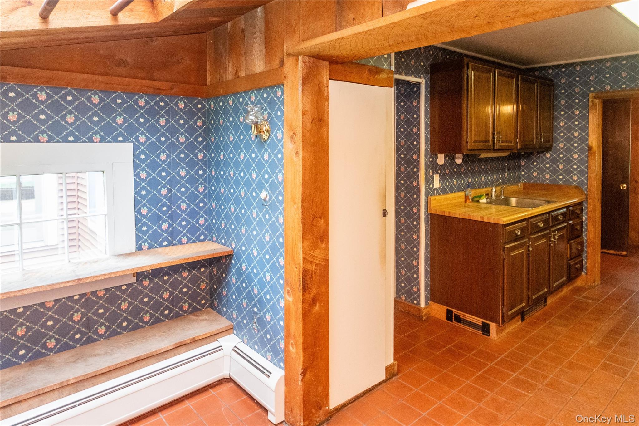 105 Jarmain Road Monroe, NY 10950 - Photo 8 of 40 a view of a bathroom with a sink and a mirror