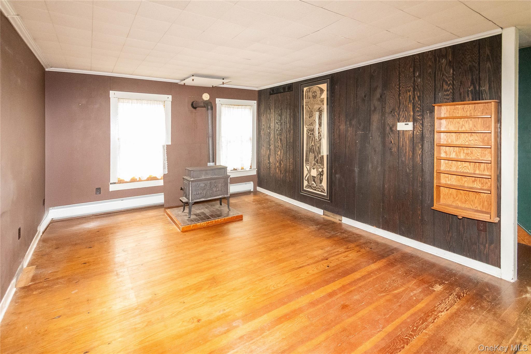 105 Jarmain Road Monroe, NY 10950 - Photo 9 of 40 a view of an empty room with a window and bathroom