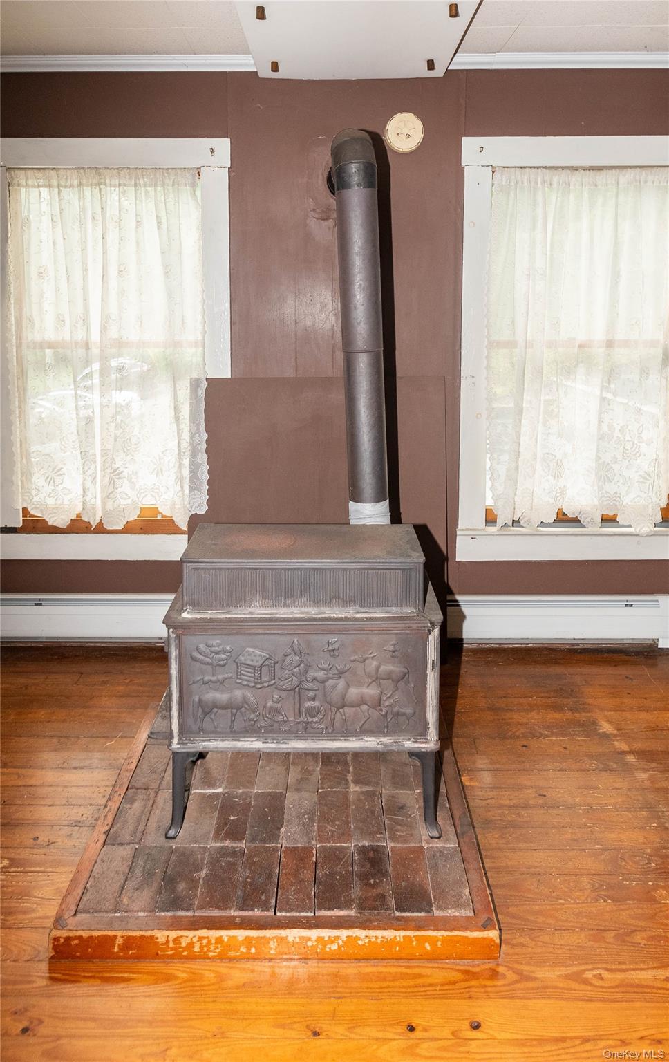 105 Jarmain Road Monroe, NY 10950 - Photo 10 of 40 a view of water pool with dining table and chairs in front of window