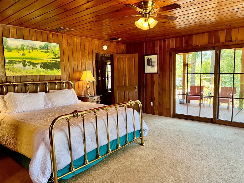 29555 Wyle Ranch Road North Fork, CA 93643 - Photo 31 of 70 a spacious bedroom with a bed and a large window