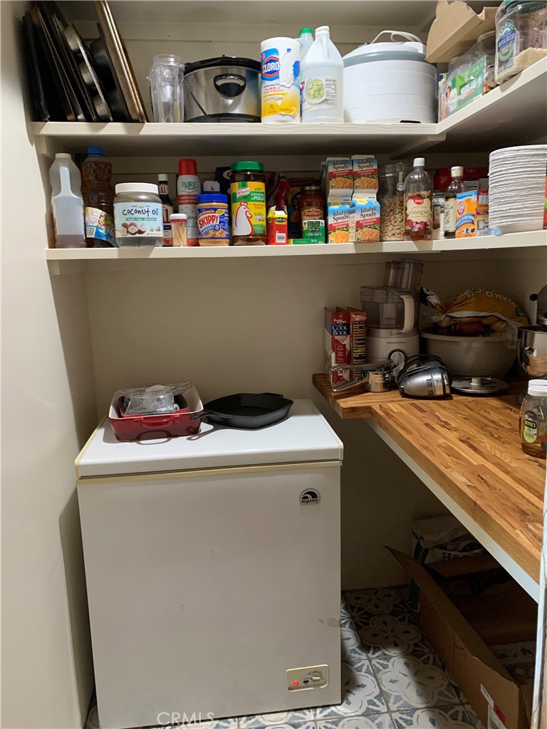 29555 Wyle Ranch Road North Fork, CA 93643 - Photo 49 of 70 a utility room with stainless steel appliances and wooden floor