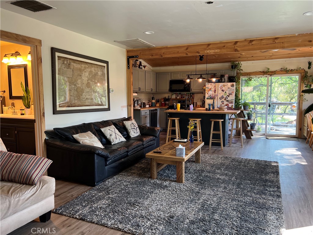 29555 Wyle Ranch Road North Fork, CA 93643 - Photo 50 of 70 a living room with furniture and a large window
