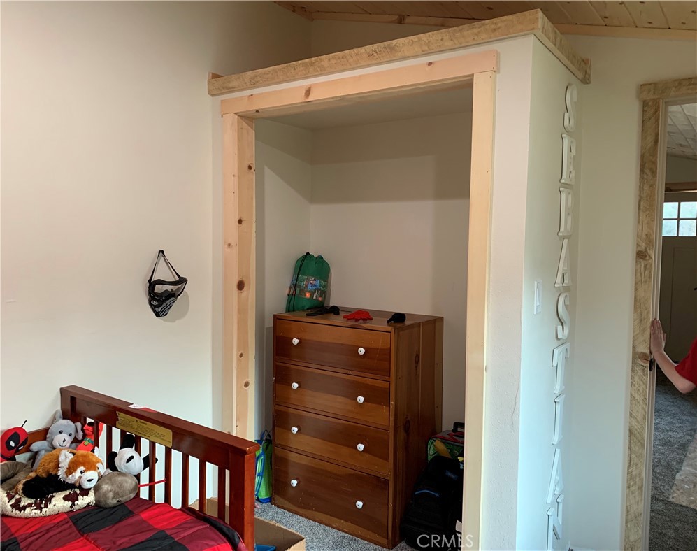 29555 Wyle Ranch Road North Fork, CA 93643 - Photo 54 of 70 a view of a hallway and closet with mirror