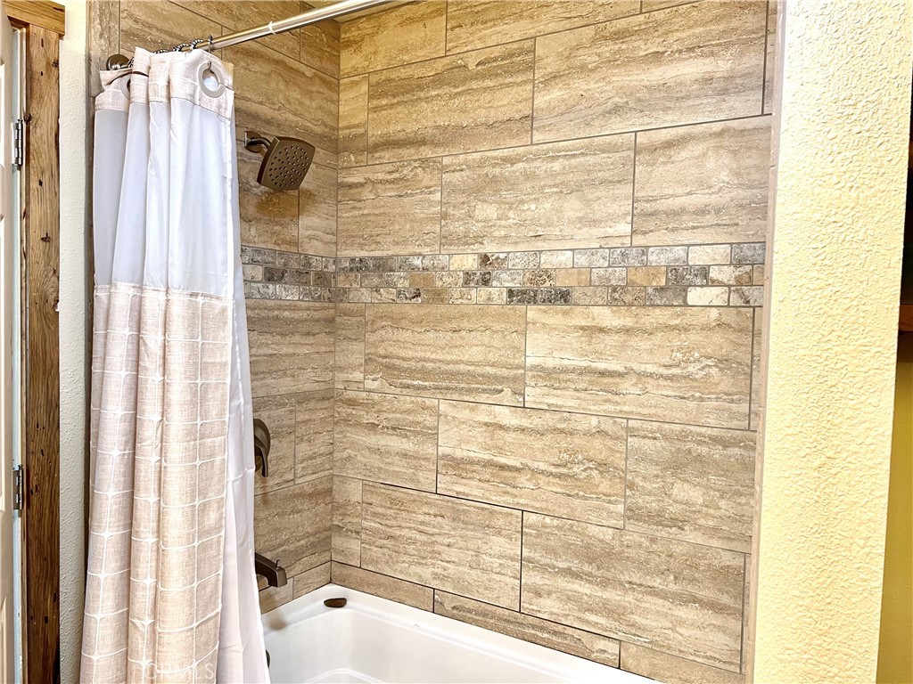 29555 Wyle Ranch Road North Fork, CA 93643 - Photo 58 of 70 a bathroom with a shower