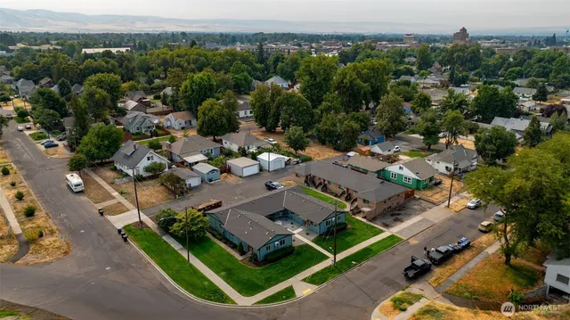 an aerial view of a house with a garden