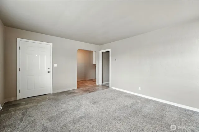 an empty room with an entryway