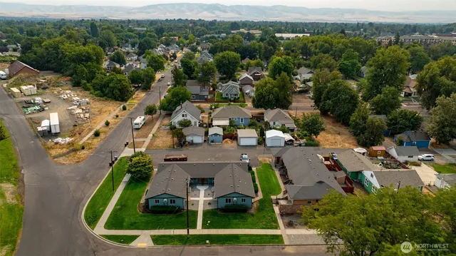 an aerial view of a house with a garden