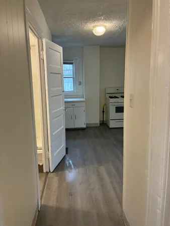 a view of walk in closet with window