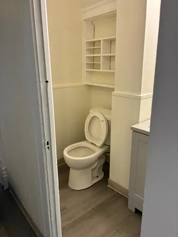a bathroom with a toilet and a sink