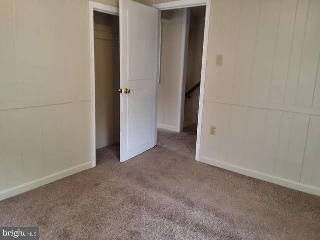 an empty room with closet