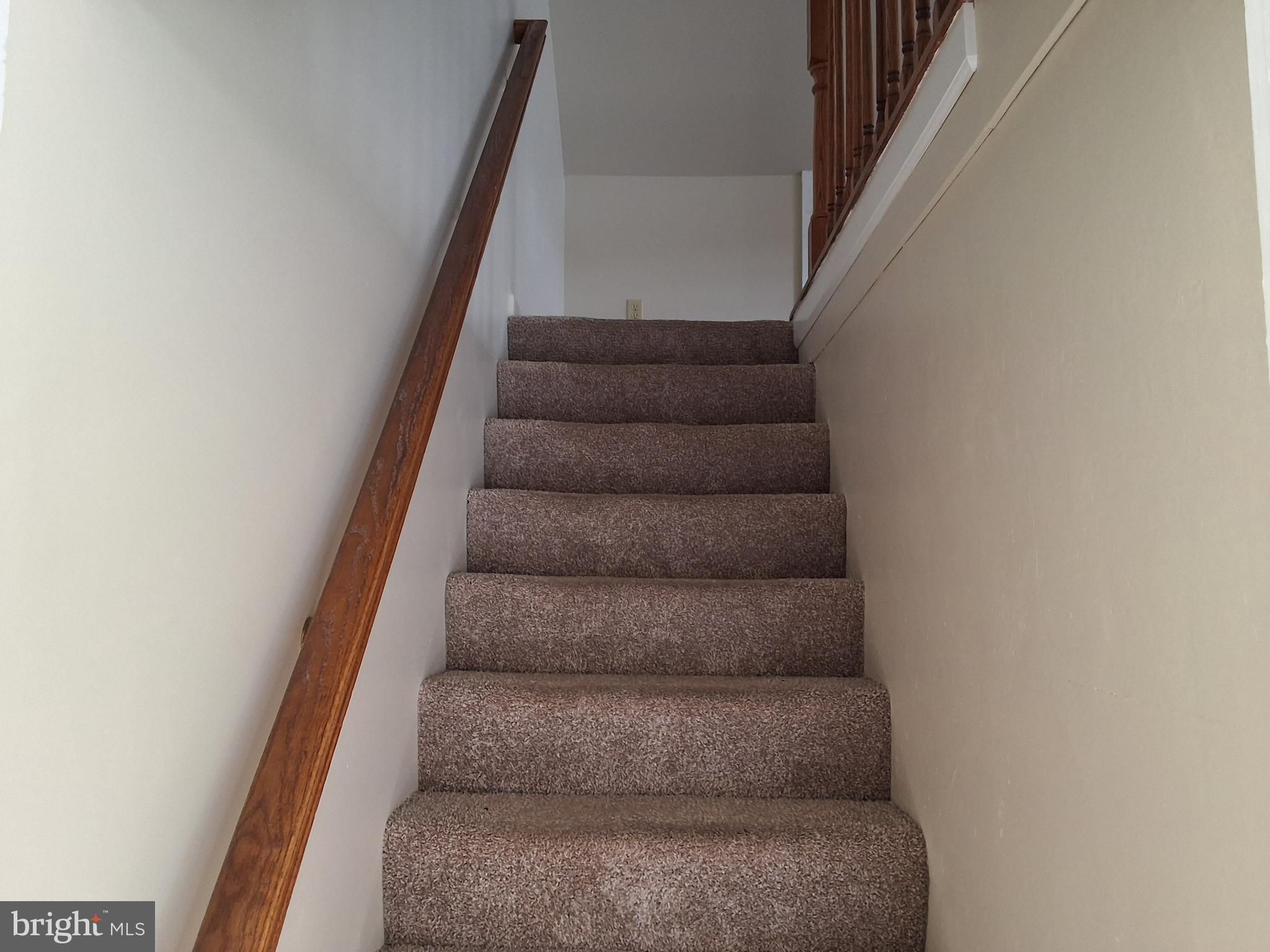 59 West Slokom Avenue Christiana, PA 17509 - Photo 25 of 28 a view of staircase with white walls