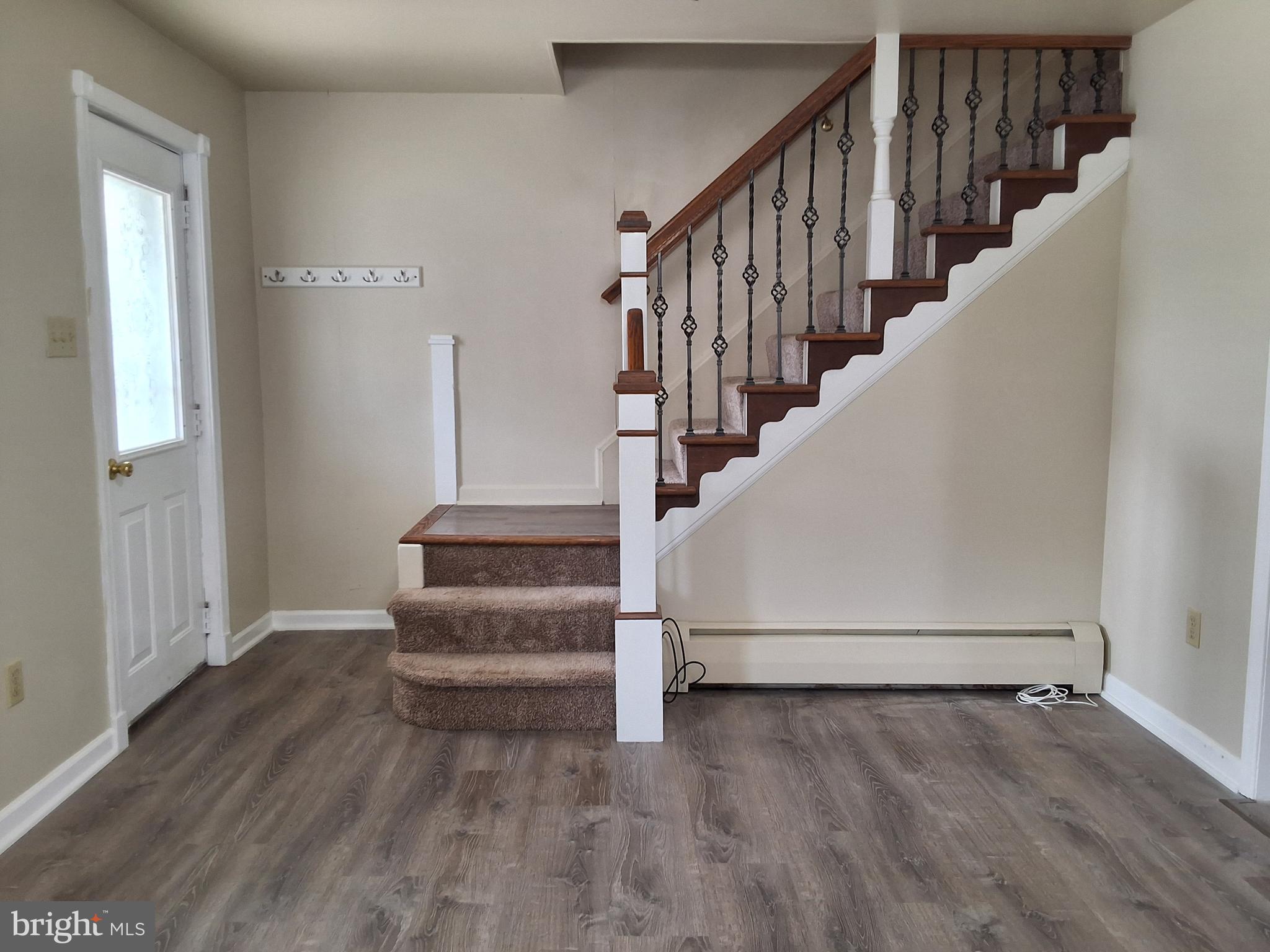59 West Slokom Avenue Christiana, PA 17509 - Photo 3 of 28 a view of entryway and hall with wooden floor