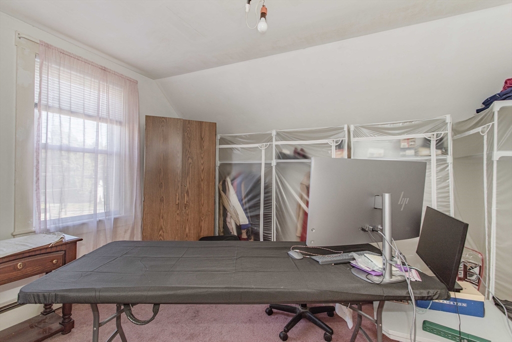 643 Center Street Raynham, MA 02767 - Photo 30 of 42 a view of a workspace with furniture