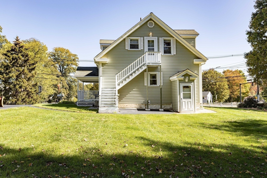 643 Center Street Raynham, MA 02767 - Photo 36 of 42 a front view of a house with a yard