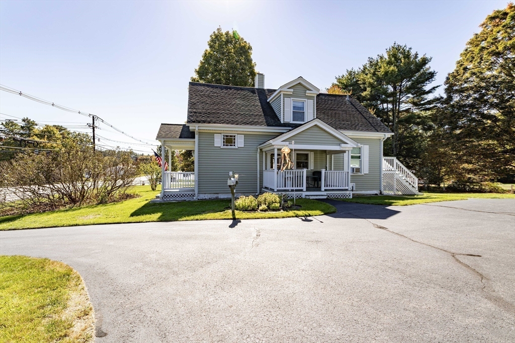 643 Center Street Raynham, MA 02767 - Photo 39 of 42 a view of house with outdoor space and swimming pool