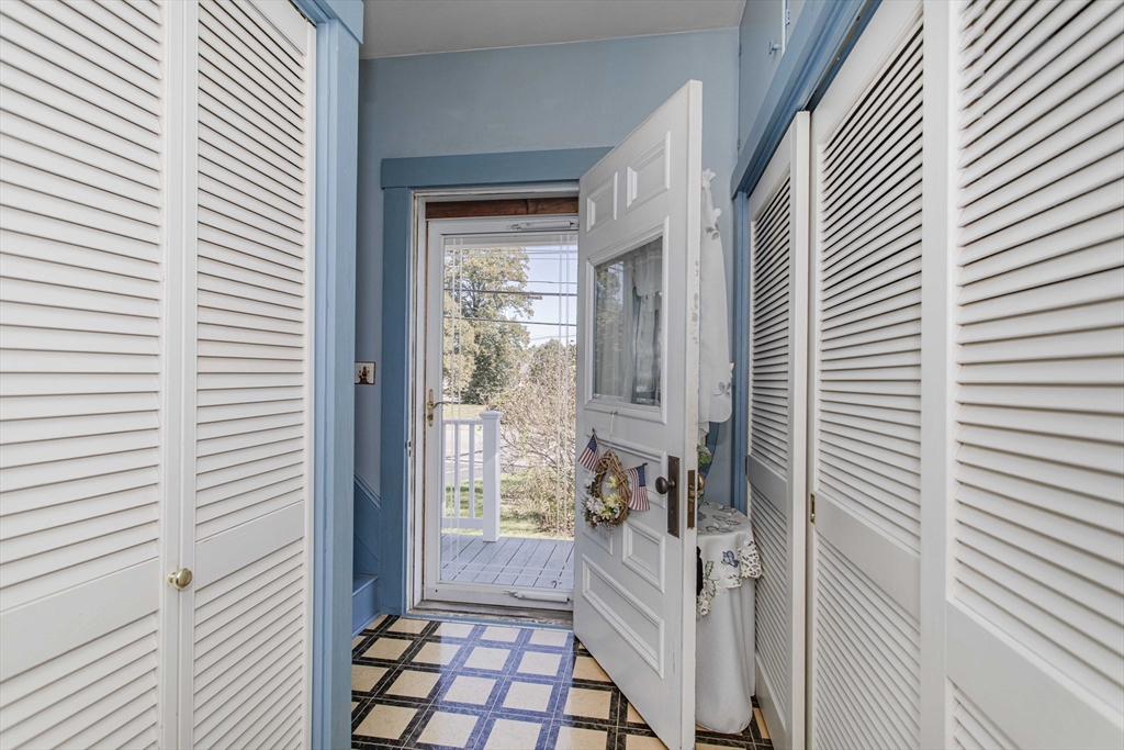 643 Center Street Raynham, MA 02767 - Photo 10 of 42 a view of a house with a porch