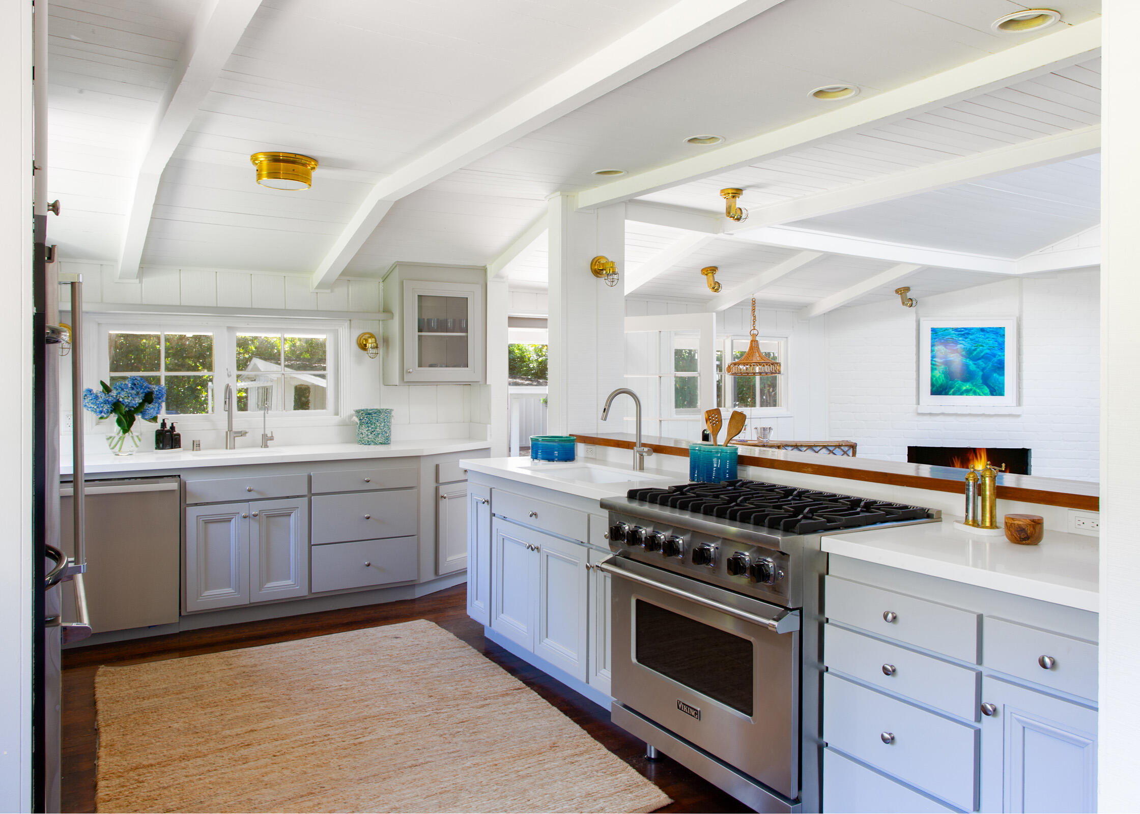 279 Santa Rosa Lane Montecito, CA 93108 - Photo 8 of 27 a kitchen with a stove and a sink