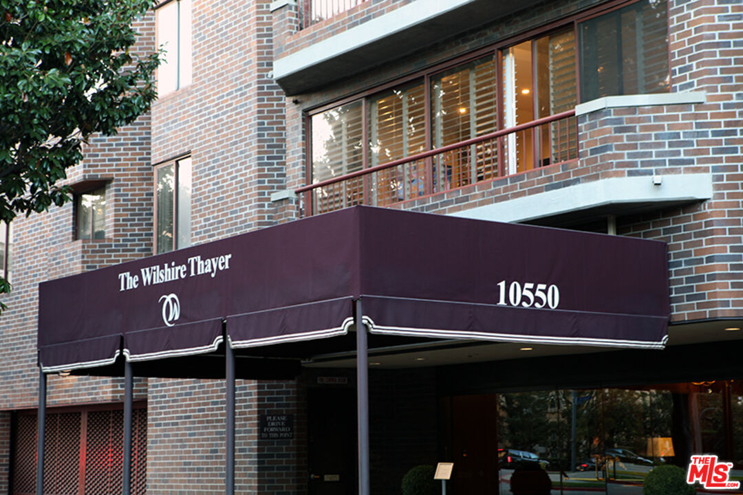 a front view of an building with retail street