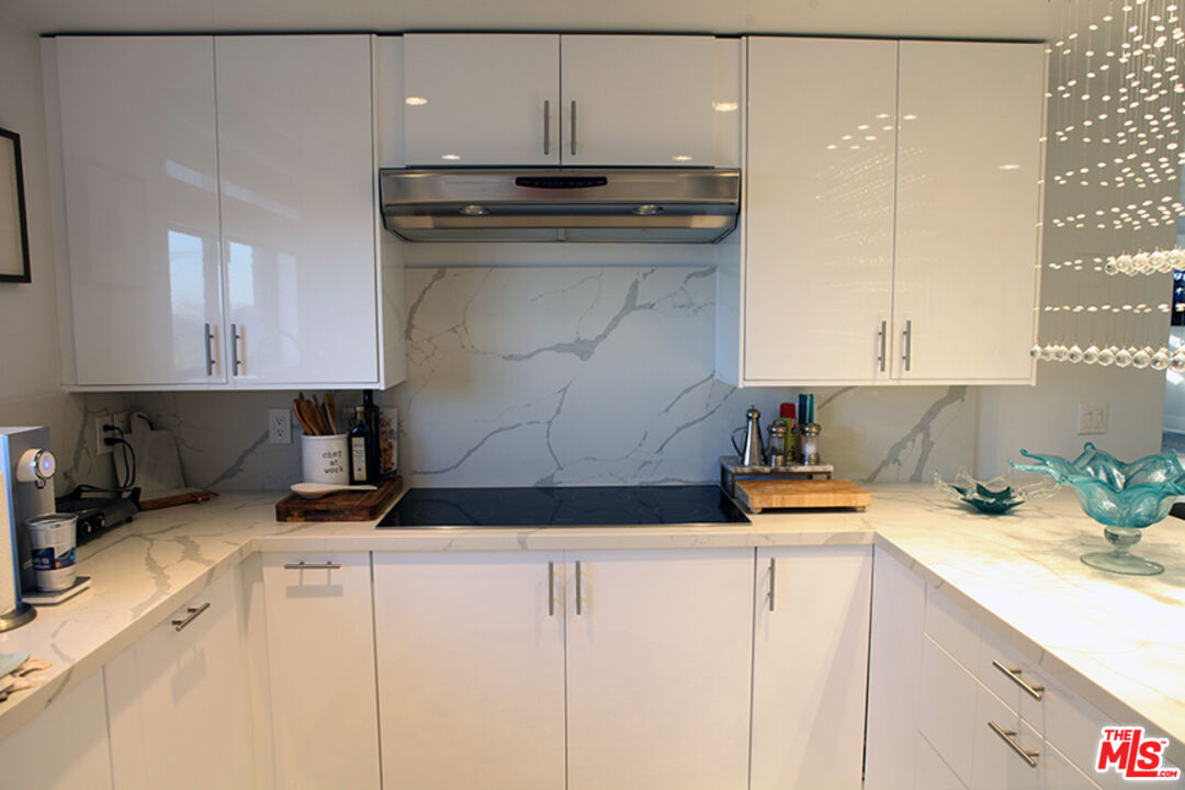 10550 Wilshire Boulevard, Unit 502 Los Angeles, CA 90024 - Photo 4 of 25 a kitchen with a sink and cabinets