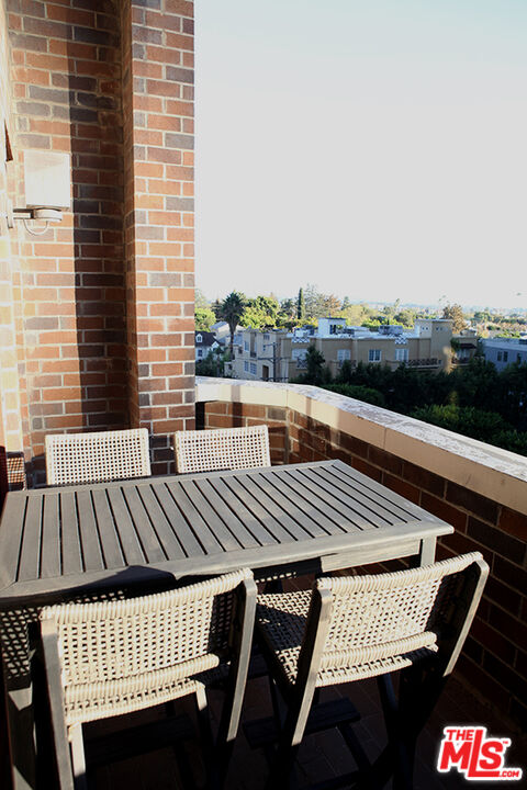10550 Wilshire Boulevard, Unit 502 Los Angeles, CA 90024 - Photo 9 of 25 a view of barbeque area with seating space