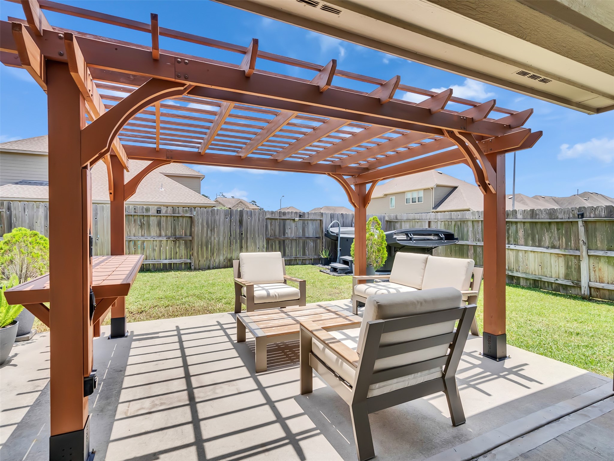 27997 Lone Hollow Lane Spring, TX 77386 - Photo 13 of 45 a outdoor space with patio the couches and a dining table with garden view