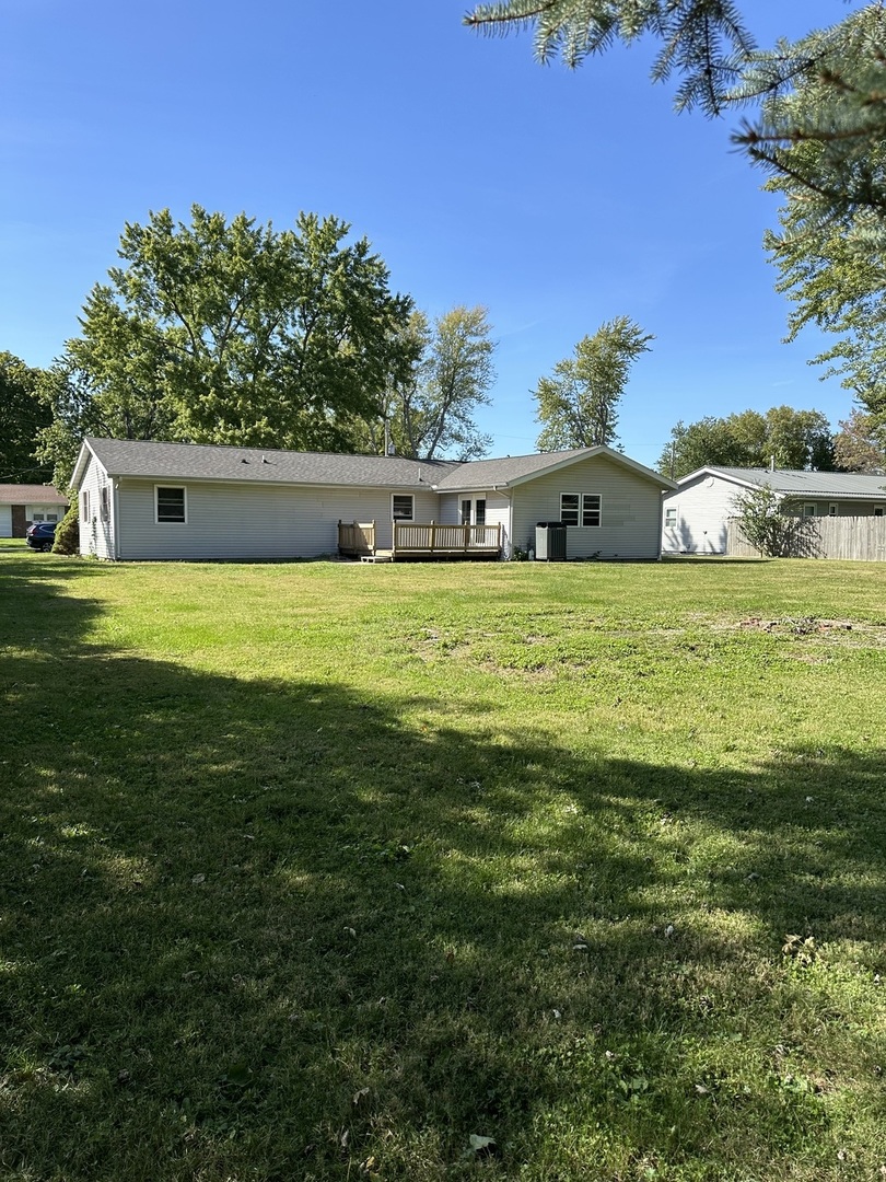 203 Ruby Street Villa Grove, IL 61956 - Photo 2 of 18 a front view of a house with a yard