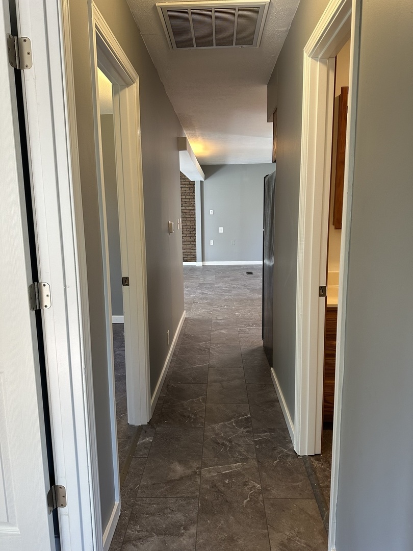 203 Ruby Street Villa Grove, IL 61956 - Photo 10 of 18 a view of a hallway
