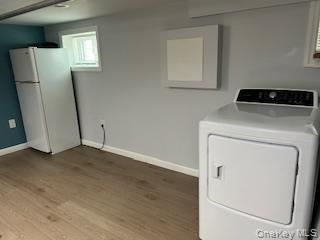 Undisclosed Address Queens, NY 11433 - Photo 6 of 7 a utility room with dryer and washer