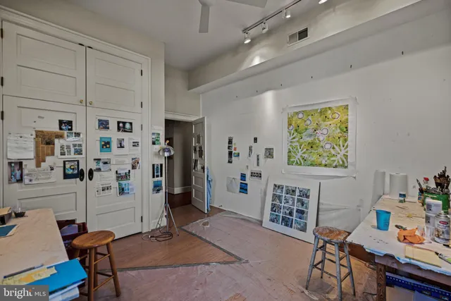 a workspace with furniture and window