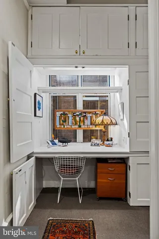 a kitchen with stainless steel appliances a sink and cabinets