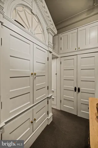 a view of an empty walk in closet