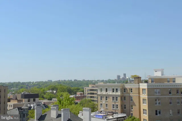 a view of a city that has tall buildings