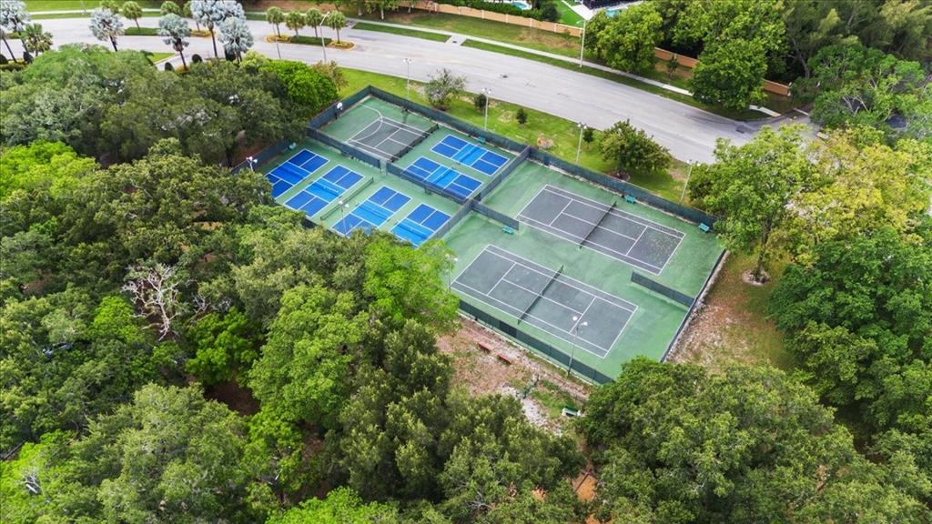 9470 Poinciana Place, Unit 103 Davie, FL 33324 - Photo 4 of 27 an aerial view of a house with a yard and lake view