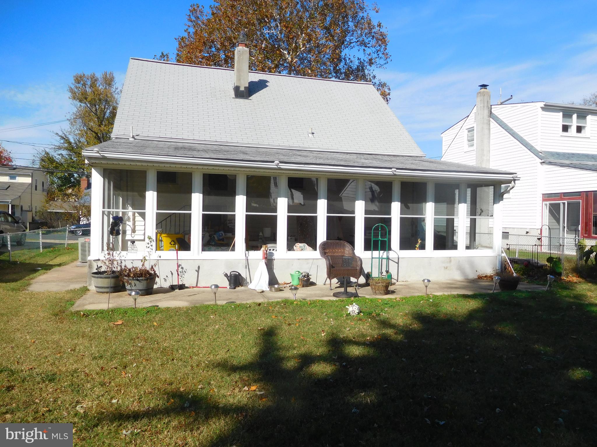 225 Asbury Road Pasadena, MD 21122 - Photo 2 of 3 enclosed back porch