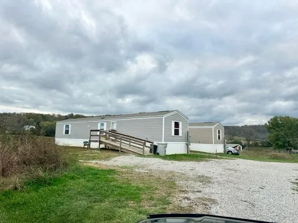 a view of a terrace with yard
