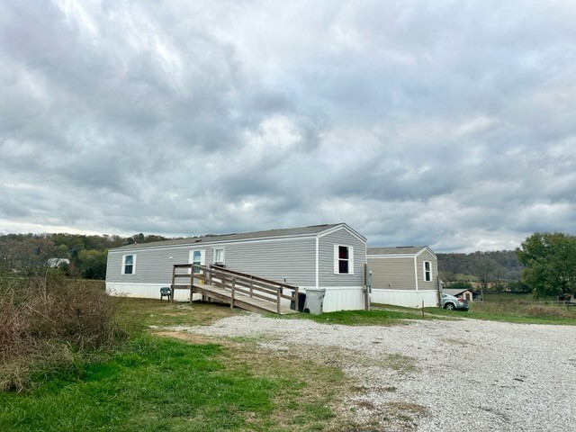 0 Loyalty Lane Sparta, TN 38583 - Photo 2 of 7 a front view of a house with a garden