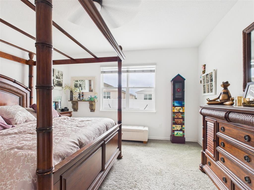 6506 Southwest 75th Ave Road Ocala, FL 34474 - Photo 24 of 28 a bedroom with a bed and a window