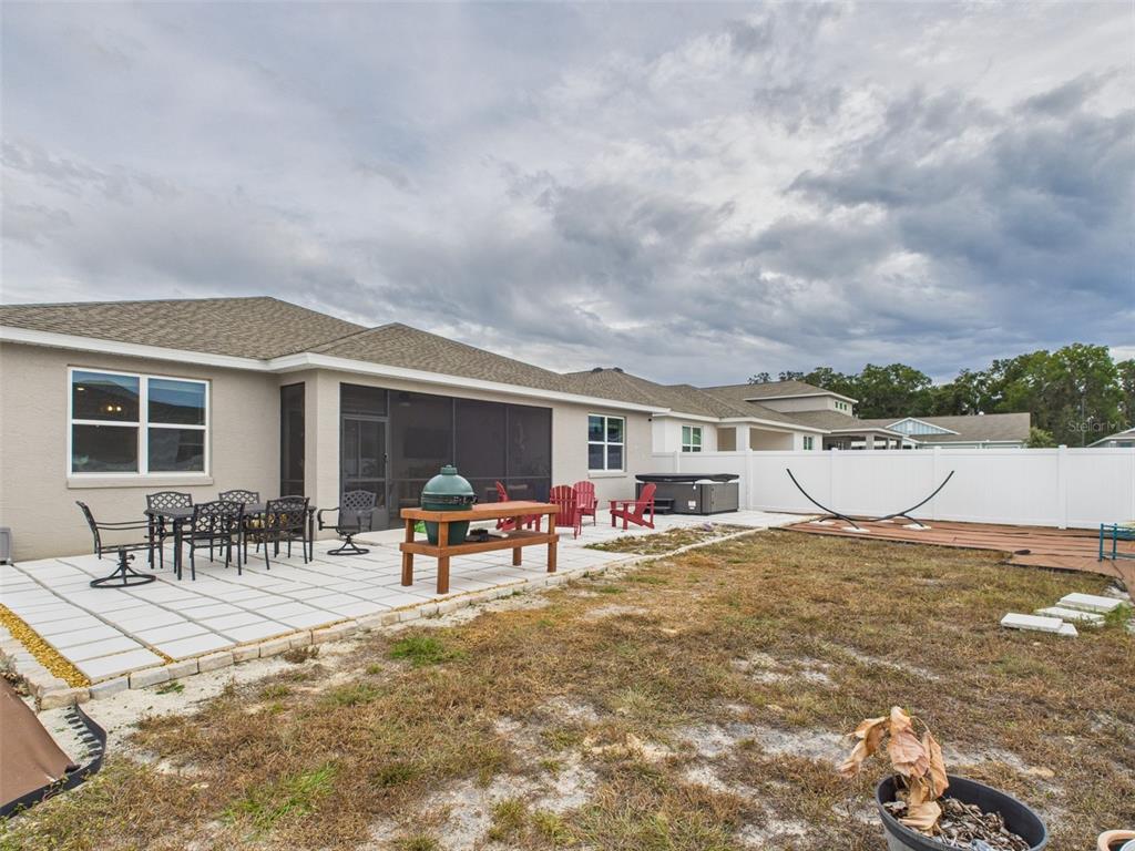 6506 Southwest 75th Ave Road Ocala, FL 34474 - Photo 27 of 28 a view of a dinning table and chairs in the patio