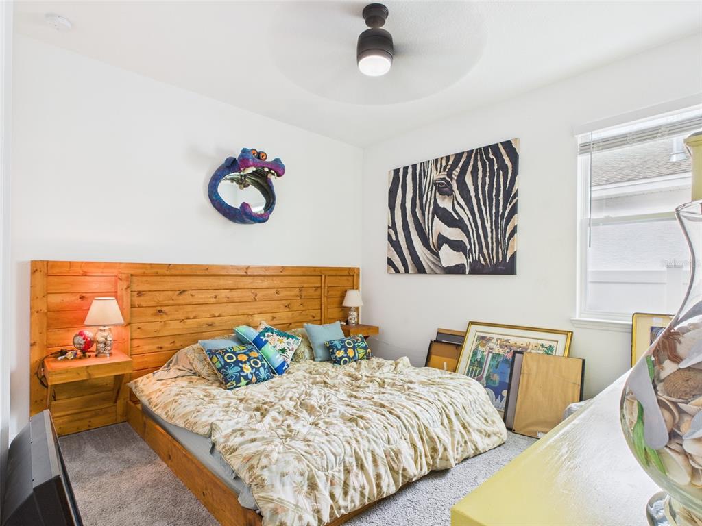 6506 Southwest 75th Ave Road Ocala, FL 34474 - Photo 8 of 28 a bedroom with two beds and a table