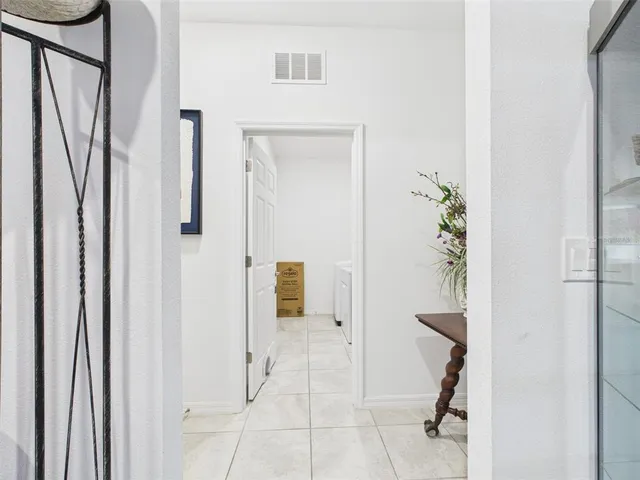 a kitchen with stainless steel appliances kitchen island granite countertop a sink and cabinets