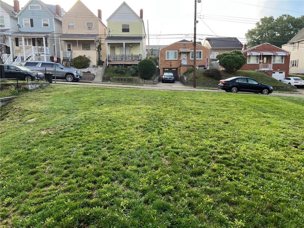 a view of a street with houses