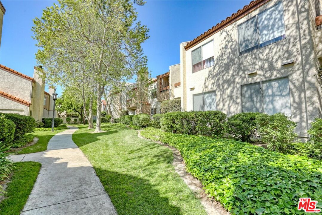 1760 Sinaloa Road, Unit 268 Simi Valley, CA 93065 - Photo 1 of 21 a view of a back yard of the house
