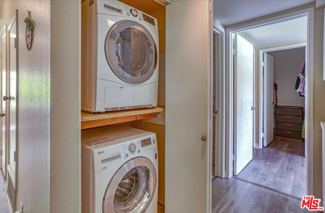 1760 Sinaloa Road, Unit 268 Simi Valley, CA 93065 - Photo 14 of 21 a view of a hallway with washer and dryer