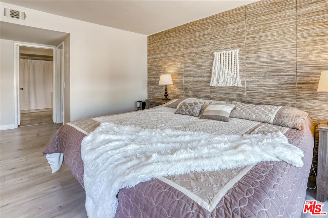 1760 Sinaloa Road, Unit 268 Simi Valley, CA 93065 - Photo 16 of 21 a bedroom with a bed and a window