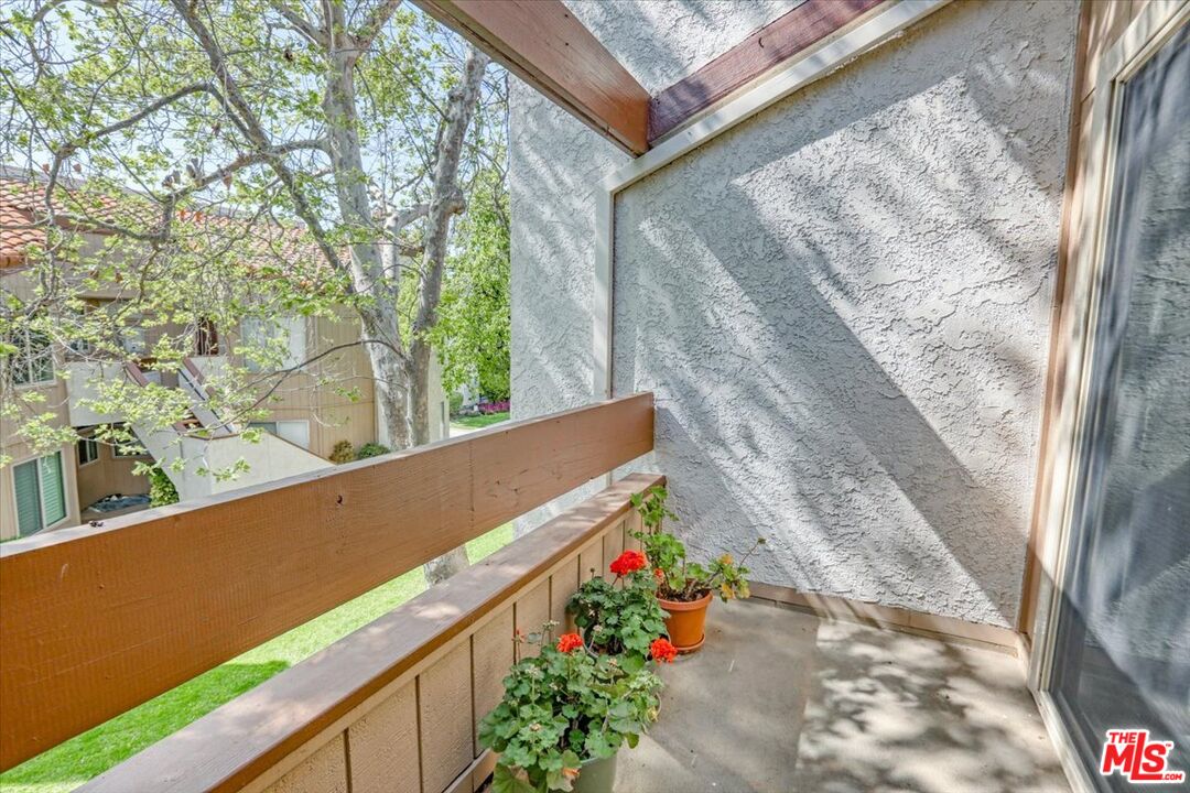 1760 Sinaloa Road, Unit 268 Simi Valley, CA 93065 - Photo 17 of 21 a view of the back yard of the house